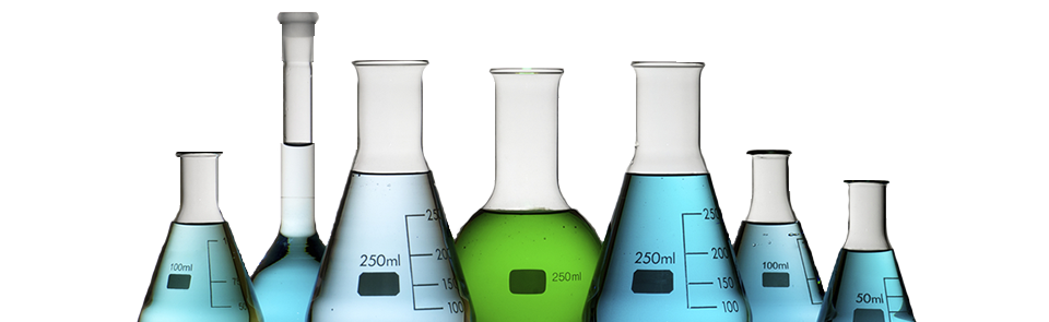 Various laboratory glassware filled with colorful liquids, including beakers and flasks, arranged in a row.
